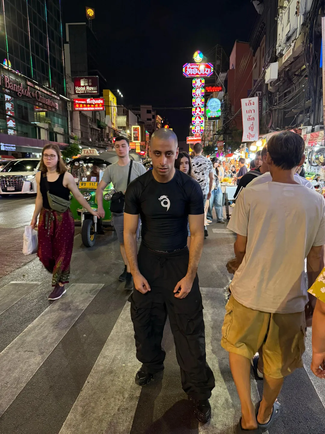 Younes performing at night in Bangkok